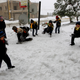 Syrian refugee children have a snowball fight at the mountain town of Bhamdoun, east of Beirut, Lebanon. AP Photos/ Bilal Hussein